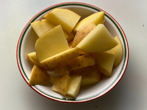 Sliced potatoes, with skin left on.